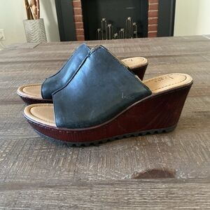 B.O.C. Born Concept black leather wedge sandals.